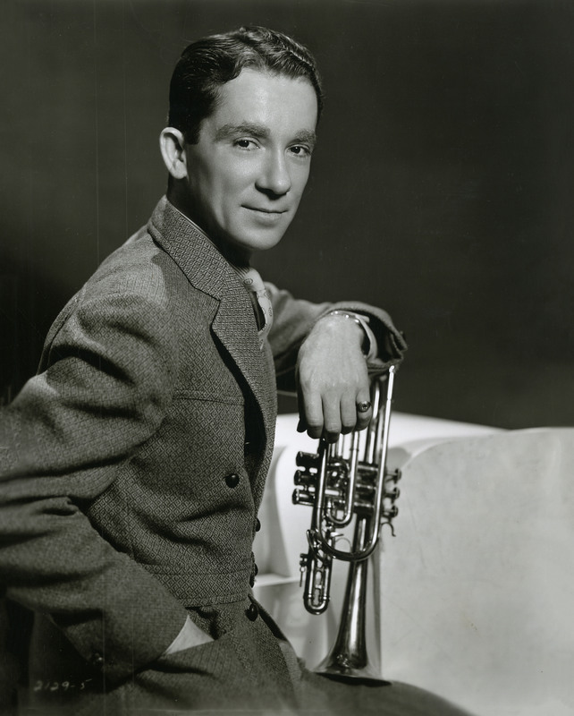 Red Nichols posing with his cornet