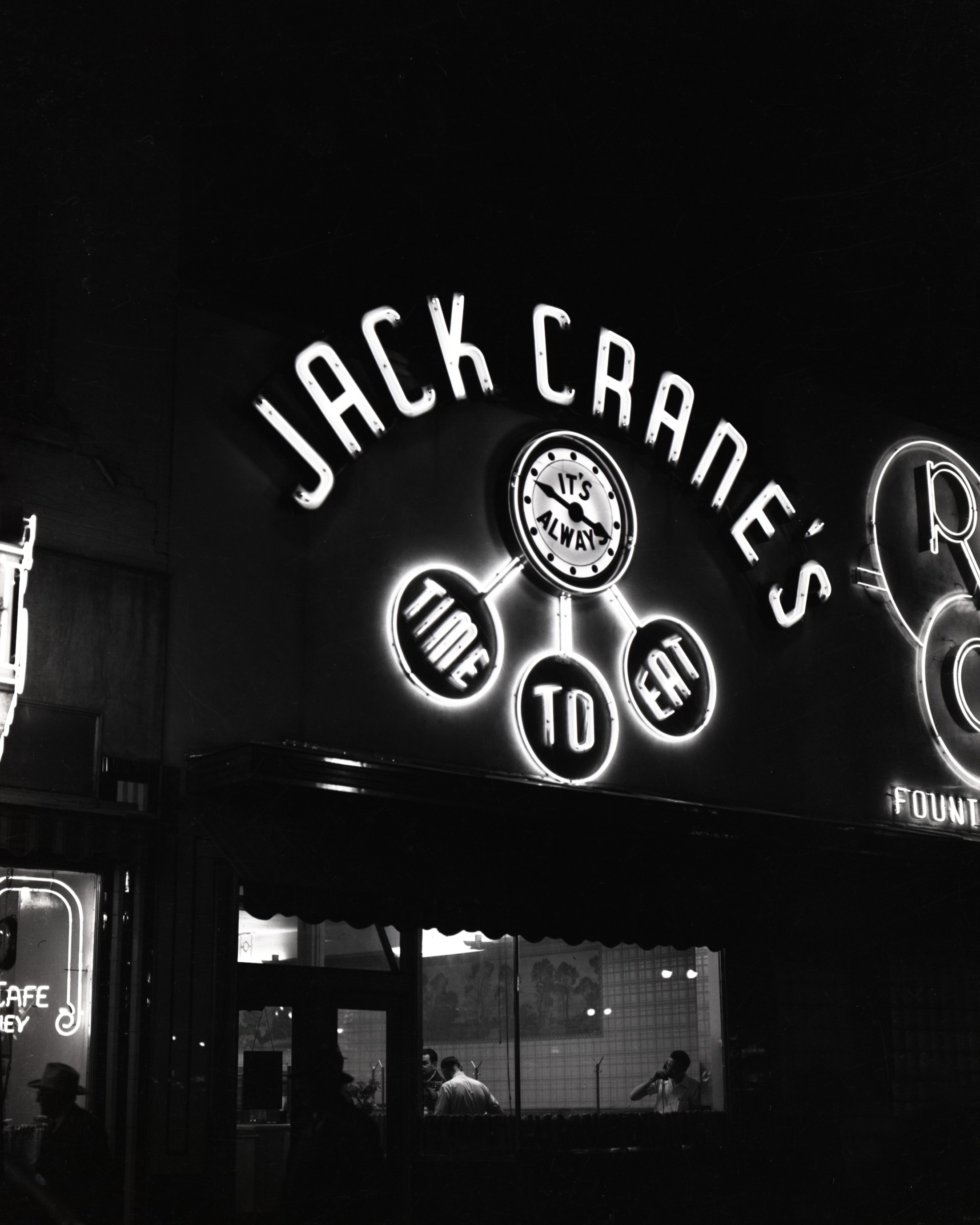 The neon sign of Jack Crane's Cafe, located at 2542 Washington Blvd