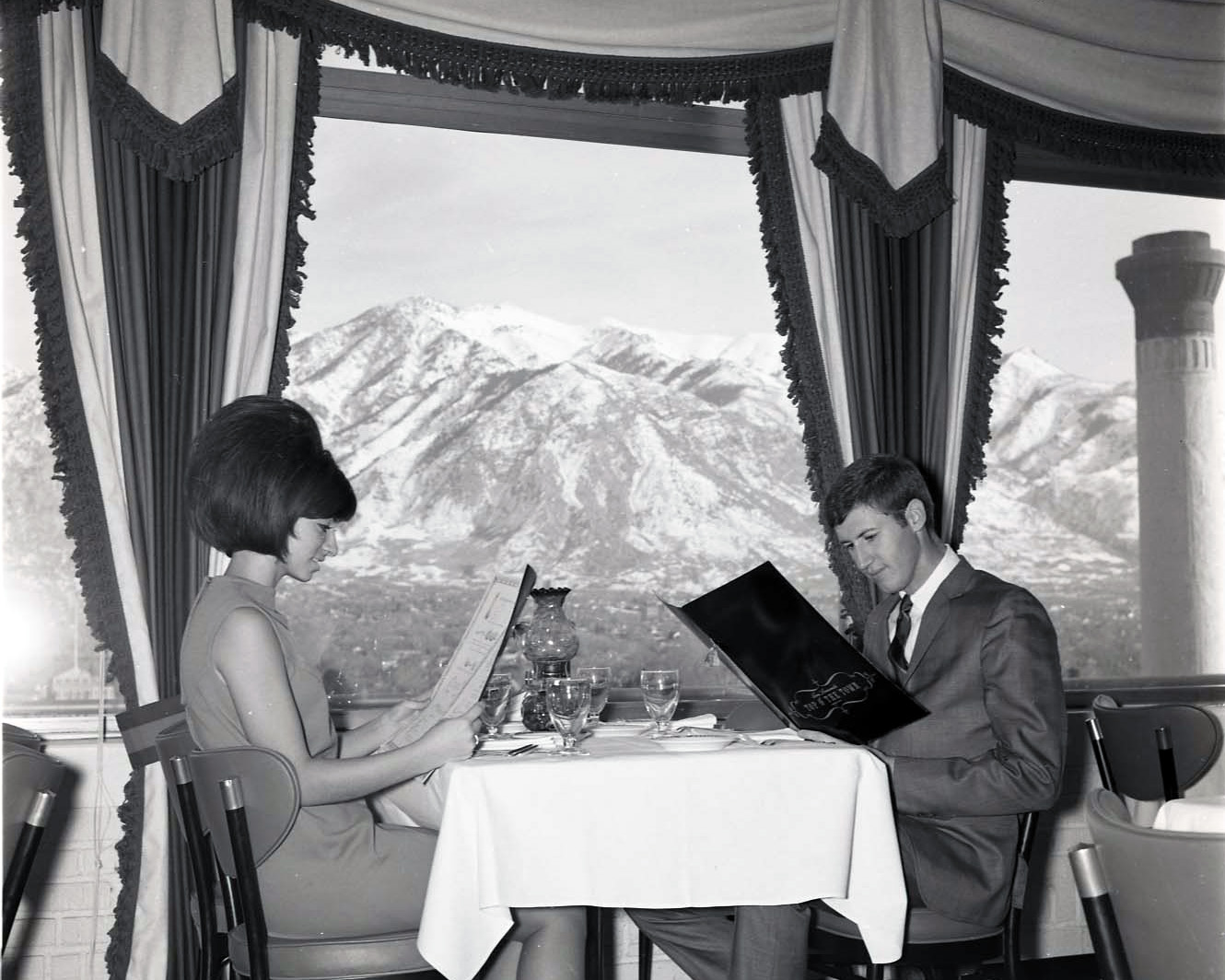Two Weber students enjoying dinner at Top O' The Town restaurant